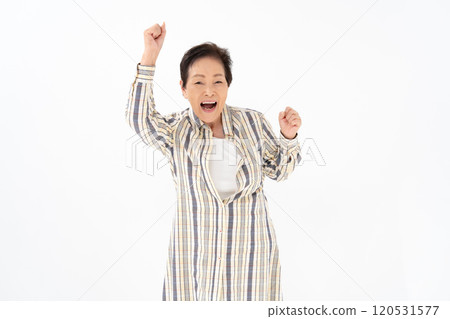 Senior woman portrait fist pump 120531577