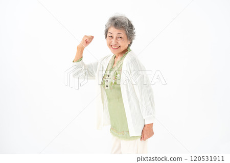 Senior woman portrait fist pump 120531911