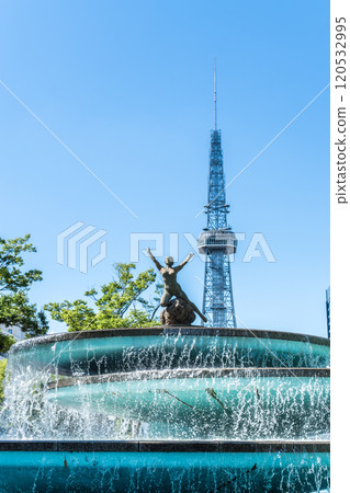 Mirai Tower seen through the fountain at Hisaya Odori Park Mirai Tower seen through the fountain at Hisaya Odori Park 120532995