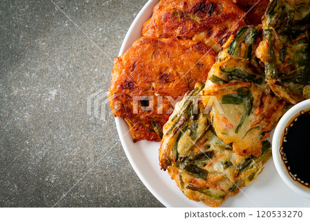 Pajeon or Korean pancake and Korean Kimchi pancake or Kimchijeon on white background 120533270