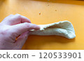Photo of bagel dough being shaped 120533901