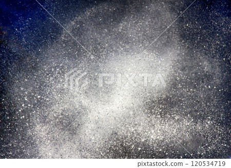 Spray of water in evening sky 120534719