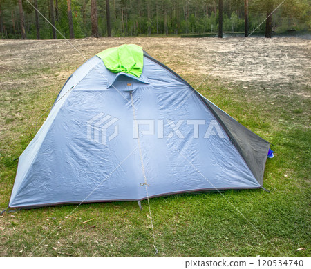 camping outdoor with tent in woods in summer camping outdoor with tent in woods in summer 120534740