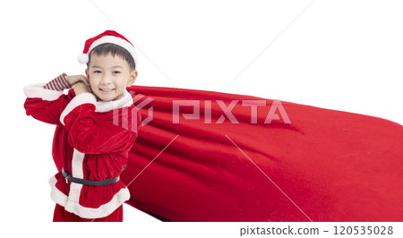 Happy kid Dressed as Santa Carrying Bag Full of Gifts Happy kid Dressed as Santa Carrying Bag Full of Gifts 120535028