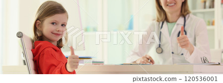 Little girl and doctor show sign of approval at appointment Little girl and doctor show sign of approval at appointment 120536001