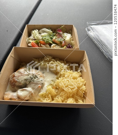 Takeout Meal with Creamy Chicken, Rice, and Fresh Salad Takeout Meal with Creamy Chicken, Rice, and Fresh Salad 120538474