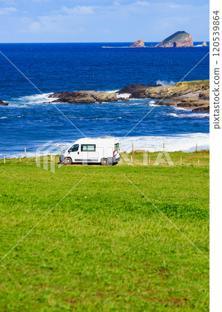 Camper van on Verdicio beach, Asturias coast in Spain. Camper van on Verdicio beach, Asturias coast in Spain. 120539864