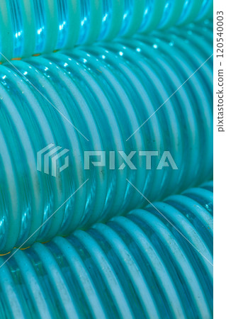 Detailed closeup of flexible plastic hose Detailed closeup of flexible plastic hose 120540003