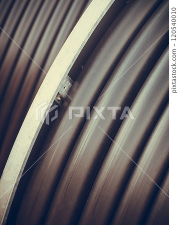 Detailed closeup of flexible plastic hose Detailed closeup of flexible plastic hose 120540010