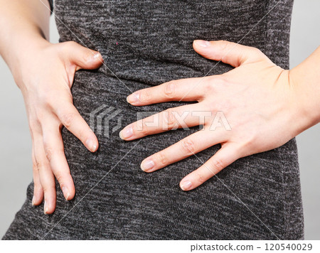 Woman having strong stomach ache. Syndroms 120540029
