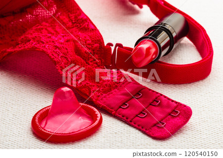 Lipstick and condom with lace lingerie. Lipstick and condom with lace lingerie. 120540150