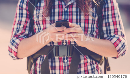 Man outdoor using cell phone Man outdoor using cell phone 120540176