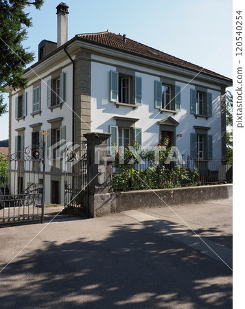 Old mansion in European Murten town in Switzerland - vertical Old mansion in European Murten town in Switzerland - vertical 120540254