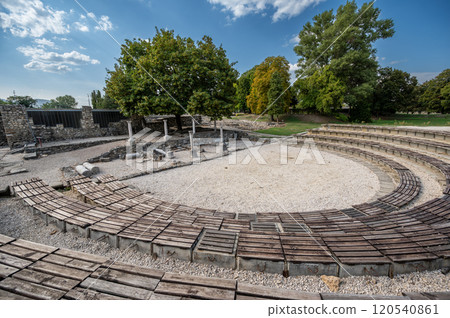 Budapest, Hungary. August 27, 2022. Roman amphitheater in Aquincum the ancient Roman city, now an archaeological site and museum. Travel destinations. 120540861