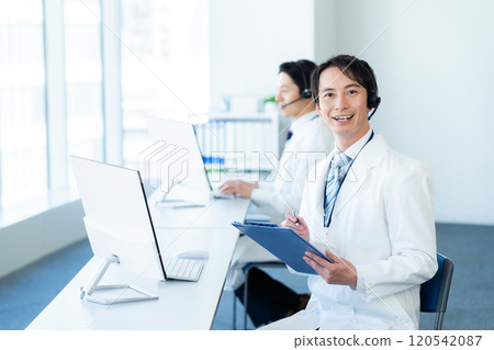 A medical professional operator wearing a white coat 120542087
