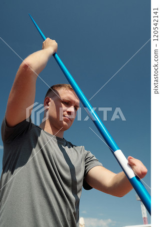 Preparing for Javelin Throw at Sports Competition 120542141