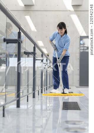 Image of building cleaning: Cleaning staff mopping the floor 120542148