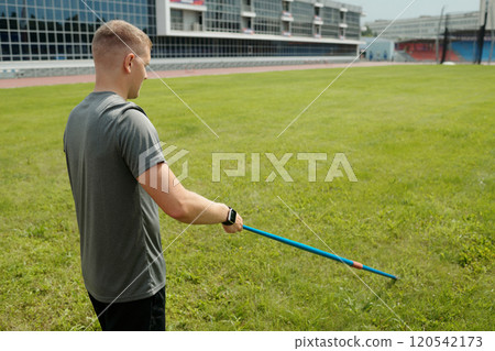 Using Pole Vaulting Equipment on Athletic Field 120542173