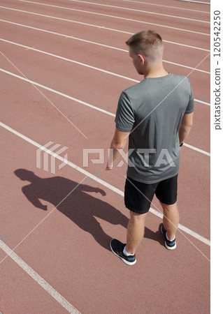 Jogging on Track with Shadow on Surface Jogging on Track with Shadow on Surface 120542250