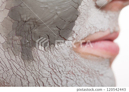 Skin care. Woman applying clay mask on face. Spa. Skin care. Woman applying clay mask on face. Spa. 120542443