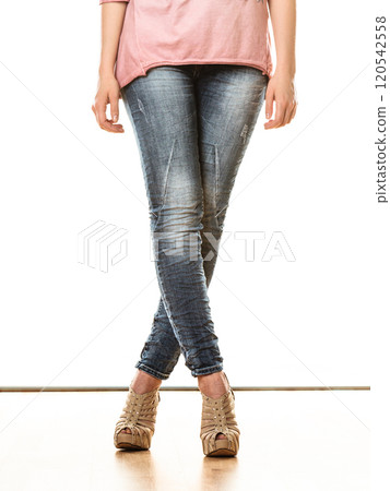 woman legs in denim trousers high heels shoes woman legs in denim trousers high heels shoes 120542558