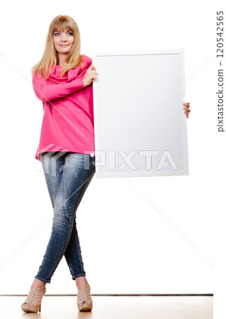 woman holding blank presentation board 120542565