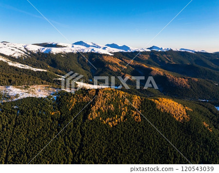 Aerial drone view of Bucegi Mountains in autumn season with snow Aerial drone view of Bucegi Mountains in autumn season with snow 120543039