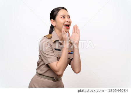Young Thai Asian Teacher in the uniform hands up to the mouth for announcement Young Thai Asian Teacher in the uniform hands up to the mouth for announcement 120544084