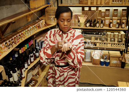 African American Woman Preparing Natural Beauty Products 120544360