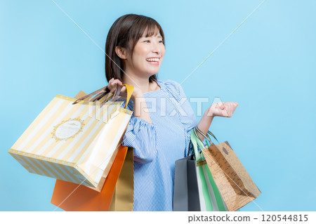 Woman shopping image 120544815