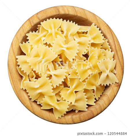 Raw farfalle pasta in a bowl isolated on white background. File Contains Clipping Path. Raw farfalle pasta in a bowl isolated on white background. File Contains Clipping Path. 120544884