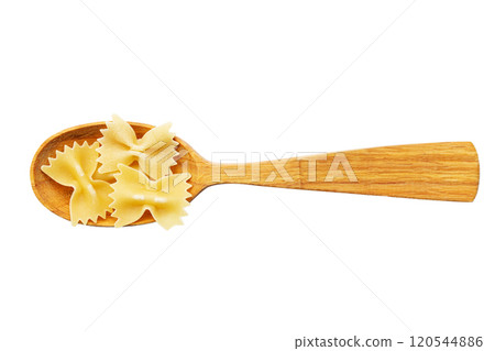Farfalle pasta in a wooden spoon isolated on white background. Farfalle pasta in a wooden spoon isolated on white background. 120544886