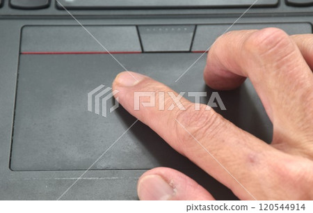 human hand used touchpad of computer laptop for working 120544914