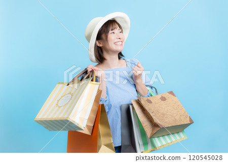 Woman shopping image 120545028