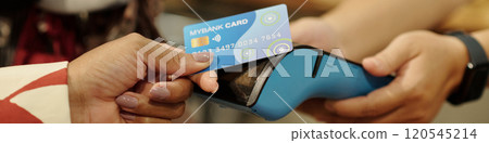 Handing Credit Card for Payment Using Card Reader 120545214