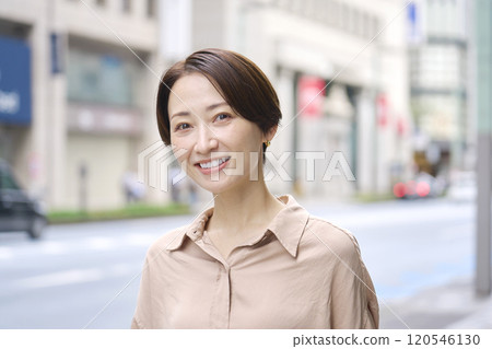Female portrait, city, looking at camera Female portrait, city, looking at camera 120546130