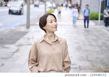 walk on the sidewalk after the rain 120546131