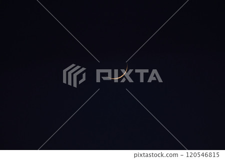 A thin crescent moon A thin crescent moon 120546815