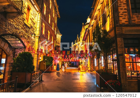 Streets of medieval stone town in Ba Na Hills Park in Da Nang in Vietnam at night 120547012