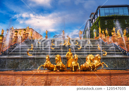 Cascades of fountain decorated with golden statues in Ba Na Hills Park in Da Nang in Vietnam Cascades of fountain decorated with golden statues in Ba Na Hills Park in Da Nang in Vietnam 120547035