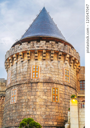 stone tower of medieval old castle in Europe 120547047