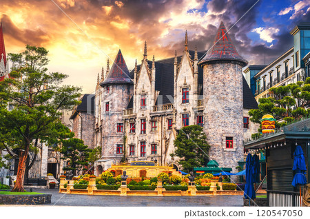 medieval beautiful castle on a square in French village in Ba Na Hills Park in Da Nang, Vietnam at sunset medieval beautiful castle on a square in French village in Ba Na Hills Park in Da Nang, Vietnam at sunset 120547050