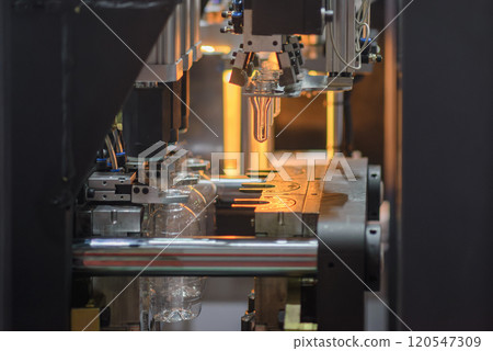 The operation of plastic bottle blowing mold machine. The operation of plastic bottle blowing mold machine. 120547309