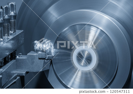Closeup scene the lathe machine finish cut the metal parts in the light blue scene. Closeup scene the lathe machine finish cut the metal parts in the light blue scene. 120547311