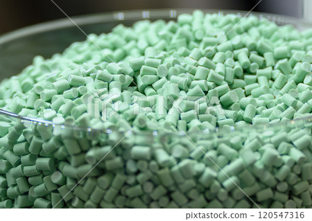 Close up scene the green pigment material for injection process. Close up scene the green pigment material for injection process. 120547316