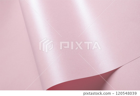 Pink paper background with a glossy texture and shimmering glow. Featuring subtle gradients, smooth 120548039