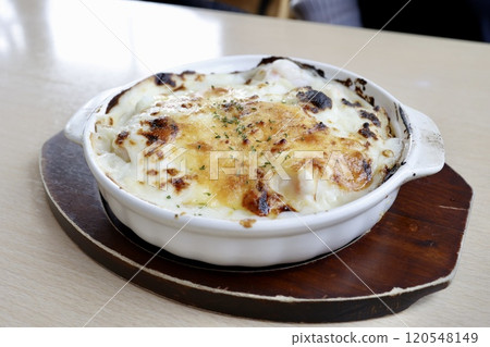Freshly made, hot, browned macaroni gratin Freshly made, hot, browned macaroni gratin 120548149