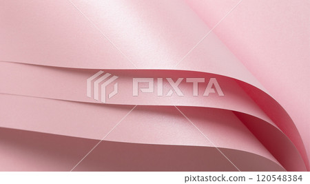Pink paper background with a soft pastel gradient and glossy texture. Featuring a polished surface 120548384