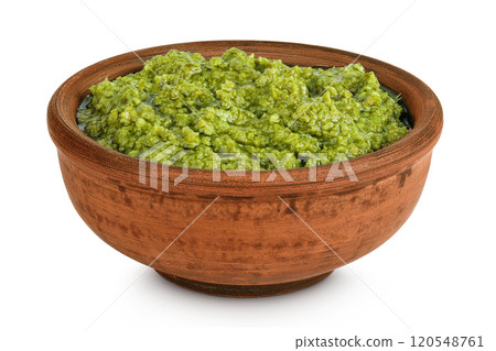 Pesto sauce in ceramic bowl isolated on white background Pesto sauce in ceramic bowl isolated on white background 120548761