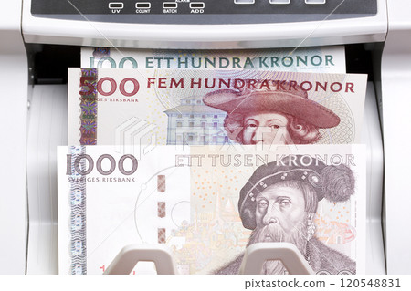 Swedish Crown in the counting machine 120548831
